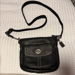 Coach Black Leather Crossbody Bag with adjustable strap.